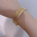 Bregje | Gouden dames armband – minimalistisch ontwerp met verfijnde glans