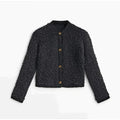 Ester | Dames cardigan met teddy knit en knopen